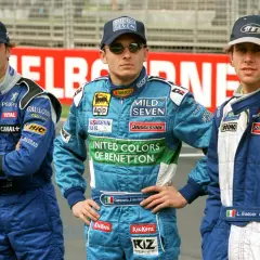I piloti italiani famosi Giancarlo Fisichella e L. Badoer in tuta da gara.