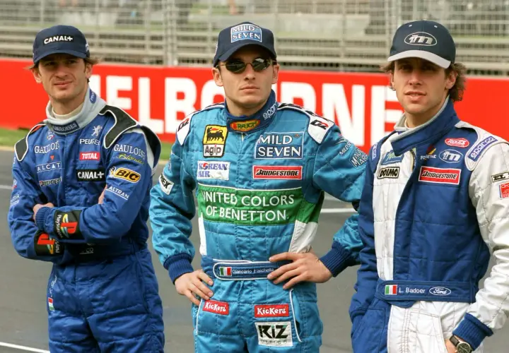 I piloti italiani famosi Giancarlo Fisichella e L. Badoer in tuta da gara.