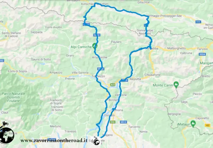 Mappa del percorso motociclistico attraverso le Alpi Carniche, con tappe a Tolmezzo, Tarvisio e il passo del Pramollo.