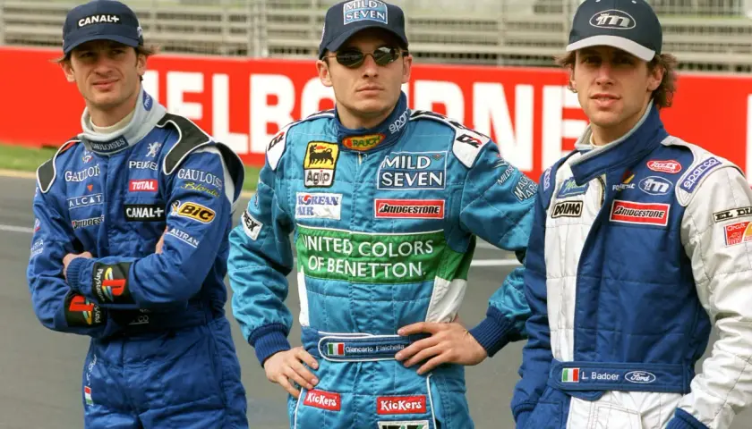 I piloti italiani famosi Giancarlo Fisichella e L. Badoer in tuta da gara.