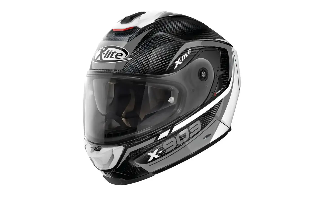 Casco X-lite X-903 con finitura in carbonio, ideale per test su strada. Design sportivo e sicuro.
